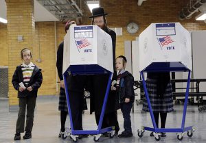Voting booths in Borough Park. AP photo by Mark Lennihan