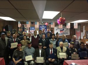 State Assemblymember Bill Colton (second row, center) honors veterans in the Bensonhurst-Gravesend area during a ceremony at the United Progressive Democratic Club. Photo courtesy of Colton’s office