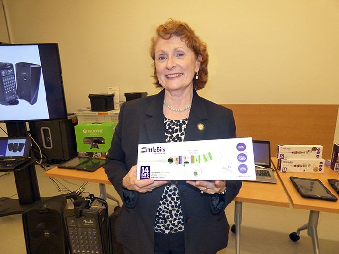 Assemblymember Jo Anne Simon holds a box of LittleBits snap together electronic components. Photo by Mary Frost