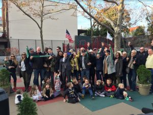 Councilmember Vincent Gentile, Parks Department officials, local residents and members of the family of the late Patrick O’Rourke celebrate the completion of renovations in the park named after O’Rourke. Photo courtesy of Gentile’s office
