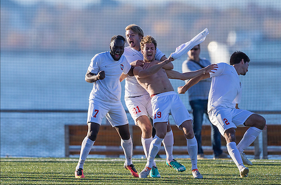 Junior Lukas Hauer ripped off his shirt and went wild with the rest of the crowd at Brooklyn Bridge Park on Sunday afternoon as the St. Francis Terriers captured their third Northeast Conference men’s soccer title in four years. Courtesy of SFC Brooklyn Athletics