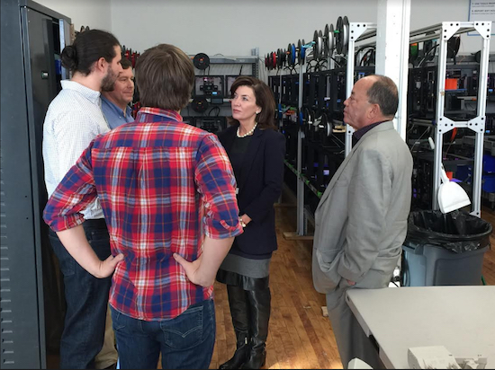Lt. Gov. Katherine Hochul and state Sen. Martin Malavé Dilan (right) discuss the benefits of the state’s Excelsior tax credit program with representatives of Voodoo Manufacturing Inc. Photo courtesy of Dilan’s office