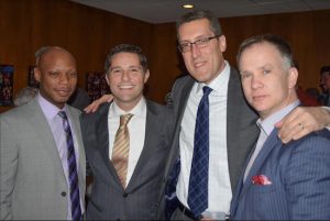 The Kings County Criminal Bar Association hosted its annual holiday party in Brooklyn Heights on Thursday where it honored a pair of retiring judges. Pictured from left: Darren Fields, Michael V. Cibella, Michael C. Farkas and Christopher Wright. Eagle photos by Rob Abruzzese