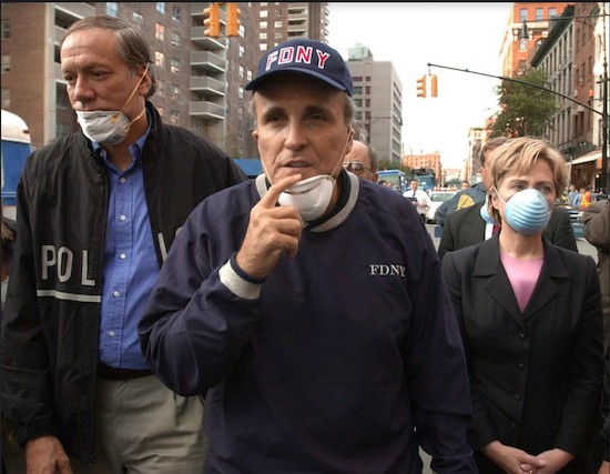 In this Sept. 12, 2001 file photo, then-New York City Mayor Rudolph Giuliani, center, leads then-New York Gov. George Pataki, left, and then-Sen. Hillary Clinton, D-N.Y., on a tour of the site of the World Trade Center disaster. AP Photo/Robert F. Bukaty