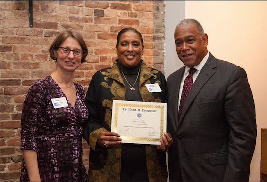 Pamela Pettyjohn (center), accepting her certificate from City Parks Foundation Executive Director Heather Lubov and New York City Parks Commissioner Mitchell Silver, spearheaded a beautification project in Kaiser Park. Photo by Melanie Rieders