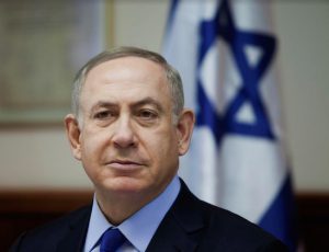 Israeli Prime Minister Benjamin Netanyahu, pictured at a weekly cabinet meeting in Jerusalem on Dec. 25, has criticized the Obama Administration over the U.N. resolution. The U.S. abstained and did not veto the measure. Dan Balilty/Pool photo via AP