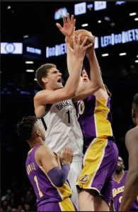 Brook Lopez goes up for two of his 20 points in the Nets’ 107-97 victory over the Lakers before a sellout crowd at Downtown’s Barclays Center on Wednesday night. AP Photo/Frank Franklin II