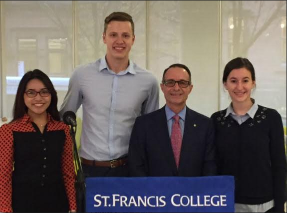 Quynh Dang ‘18, Stefan Ivanovic ‘18, Senior Executive Vice President and  Chief Operating Officer of Investors Bank Domenick A. Cama and Arhontisa Sartzetakis ’19. Photo courtesy of St. Francis College