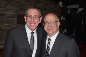 For its final monthly CLE meeting of the year, the Bay Ridge Lawyers Association (BRLA) invited Justice Jeffrey Sunshine (pictured right with BRLA President Stephen Spinelli) to give his annual lecture on matrimonial law. Eagle photos by Rob Abruzzese