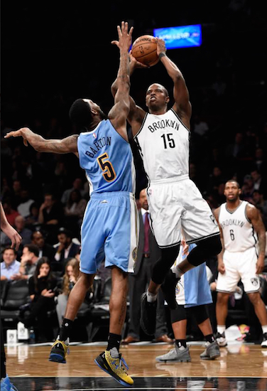 Brooklyn native Isaiah Whitehead soars for two of his career-high 14 points during the Nets’ win over Denver Wednesday night at the Barclays Center. Earlier in the day, Whitehead had his No. 15 jersey retired at Lincoln High School. AP Photo