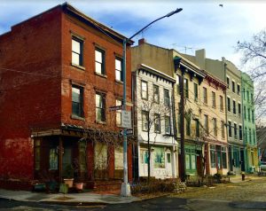 Welcome to lovely landmarked Vinegar Hill. These Greek Revival-style rowhouses are located (left to right) at 49 to 59 Hudson Ave. Eagle photos by Lore Croghan