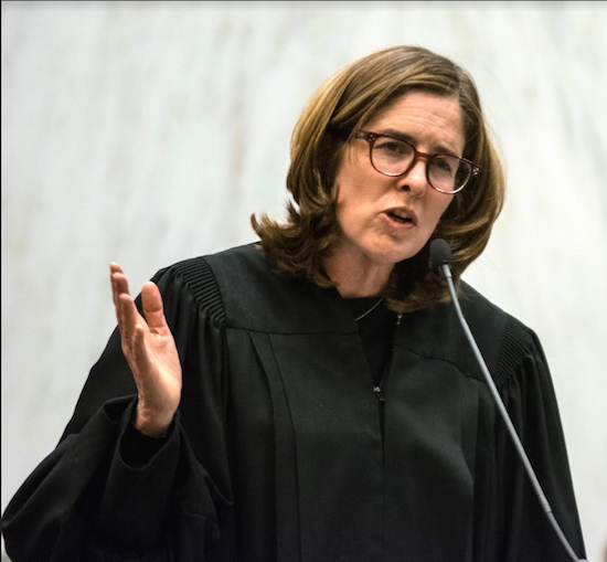 Justice Ann Donnelly speaks at her installation ceremony at the U.S. District Court for the Eastern District of New York in 2016. Eagle file photo by Rob Abruzzese