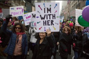 Demonstrators march up Fifth Avenue during a women's march, Saturday, Jan. 21, in New York. The march was held in solidarity with similar events taking place in Washington and around the nation. AP Photo/Mary Altaffer