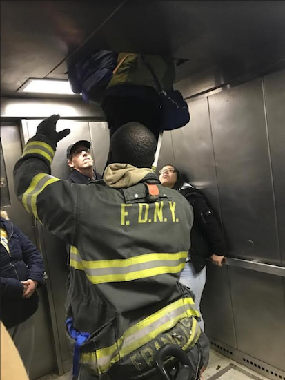 FDNY officials removed 20 trapped passengers from the Court Street R train station elevator on Wednesday afternoon. This was the second time since the summer that the elevator has stalled with straphangers inside. Photos by Rachel Jo Silver