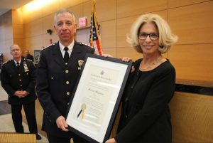 Chief Judge Janet DiFiore presents Chief Michael Magliano with a proclamation after she officially swore him in as the new chief of public safety for the New York State Unified Court System. Eagle photos by Mario Belluomo