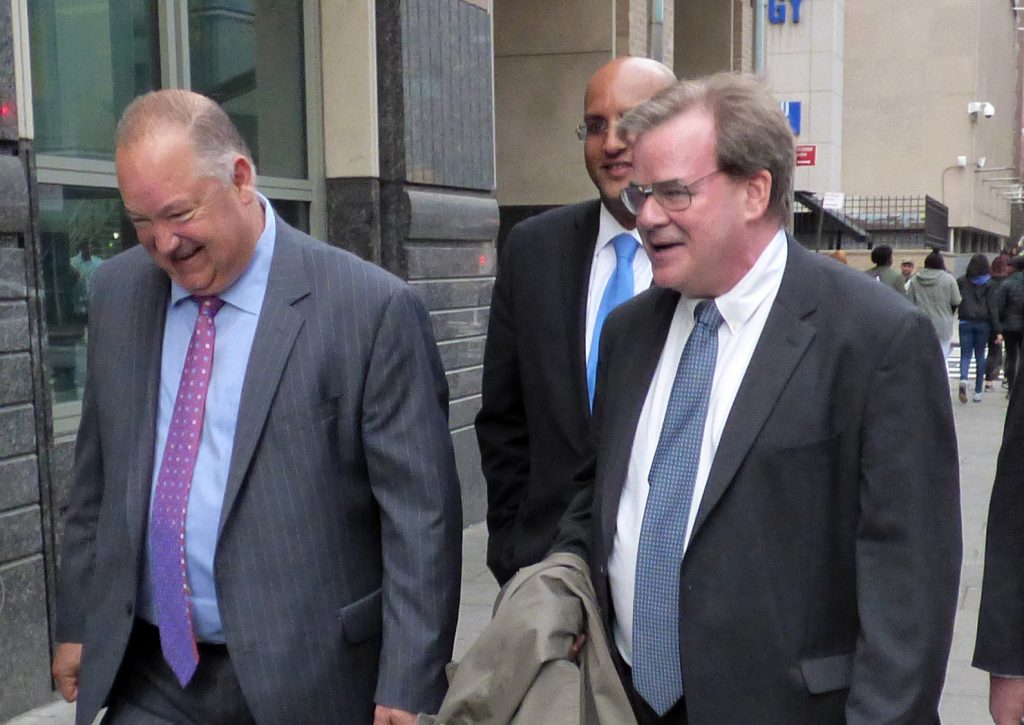 Brooklyn attorney John O’Hara, right, walks with his lawyer Dennis Kelly after his felony conviction was cleared on Thursday. Photo by Mary Frost