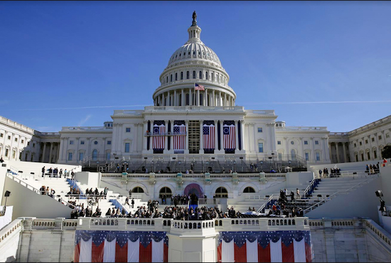 The U.S. Capitol looms over a stage during a rehearsal of President-elect Donald Trump's swearing-in ceremony in Washington. AP Photo/Patrick Semansky
