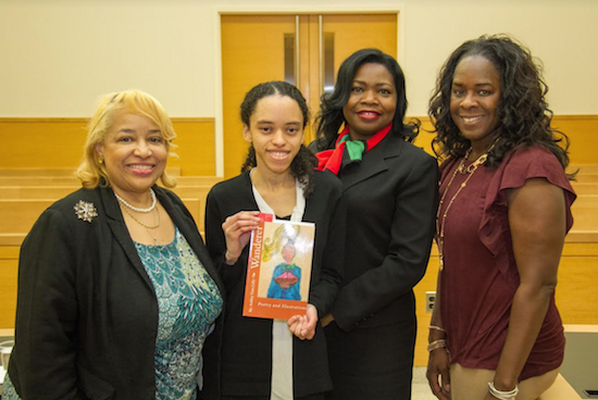 Ashley Lilly, second from left, poses with her book, "Wanderer," with (from left) Hon. Deborah Dowling and Hon. Genine Edwards and Leah Richardson. Photos courtesy of the Kings County Courts.
