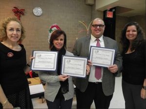 Bay Ridge Cares leaders Karen Tadross (second from left) and Justin Brannan accepted certificates of appreciation for their work in helping the recovery effort after Superstorm Sandy in 2012 from Community Board 10 officials Joanne Seminara (left) and Josephine Beckmann. Eagle file photo by Paula Katinas