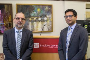 Vice Dean William Araiza (second from right, seated) and professor Sabeel Rahman (right) hosted the first of a series of "pop-up classes" at Brooklyn Law School on Wednesday as part of a series called "Legal Lunches" that will examine President Donald Trump's actions and the law. Eagle photo by Rob Abruzzese