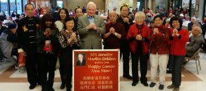 State Sen. Golden gives greetings to the seniors at 9000 Shore Hill and announces details of his Lunar New Year event. Photo courtesy of Marty Golden
