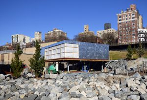 This structure, rising east of the picnic area at Brooklyn Bridge Park, is a new boathouse for the park’s community programs. It’s part of a larger Pier 5 uplands project. Eagle photo by Mary Frost