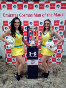 The New York Cosmos were officially welcomed to Coney Island on Monday night. Shown: Cosmos cheerleaders stand in front of the NASL championship trophy, which the Cosmos won last season. The team has won eight NASL championships, including last season and three times in the last four years. Eagle photos by Arthur De Gaeta