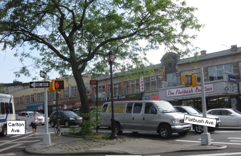 BEFORE -The current traffic triangle at the intersection of Flatbush and Carlton avenues. Photo courtesy of DOT