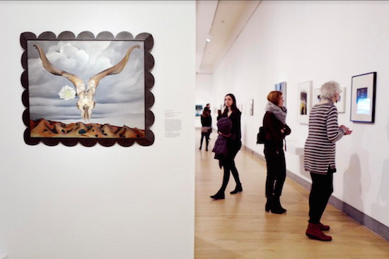 Visitors to the Brooklyn Museum look at an exhibit of work by Georgia O'Keeffe. The 1935 painting "Ram's Head: White Hollyhock-Hills" hangs on the left. The American artist died in 1986. AP Photos/Mark Lennihan