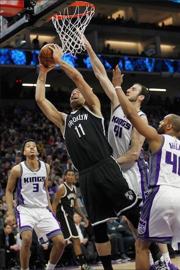 Brook Lopez became just the second Net ever to reach 10,000 career points and, more importantly, helped Brooklyn end its season-high 16-game losing streak Wednesday night in Sacramento. AP photo by Steve Yeater
