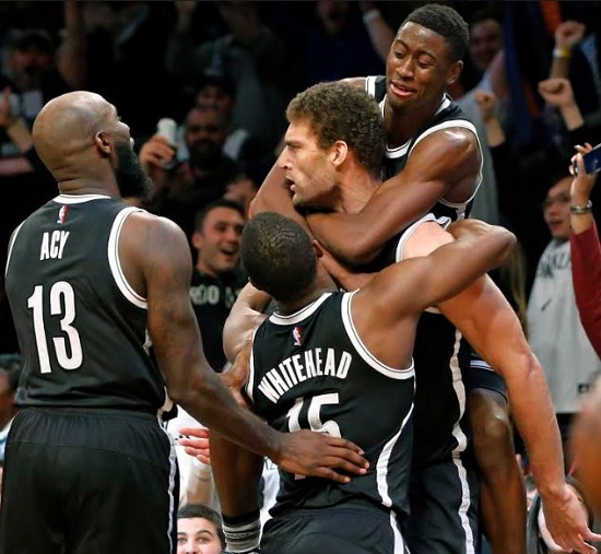 Nets center Brook Lopez launches what proved to be the game-winning, buzzer-beating jumper Tuesday night in front of 14,343 fans at Downtown’s Barclays Center. AP photo