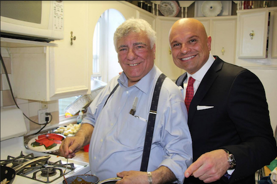 Hon. Frank Seddio (left) gets a visit in the kitchen from Arthur Aidala, the immediate past president of the Brooklyn Bar Association, during his annual St. Joseph’s feast. Eagle photos by Rob Abruzzese