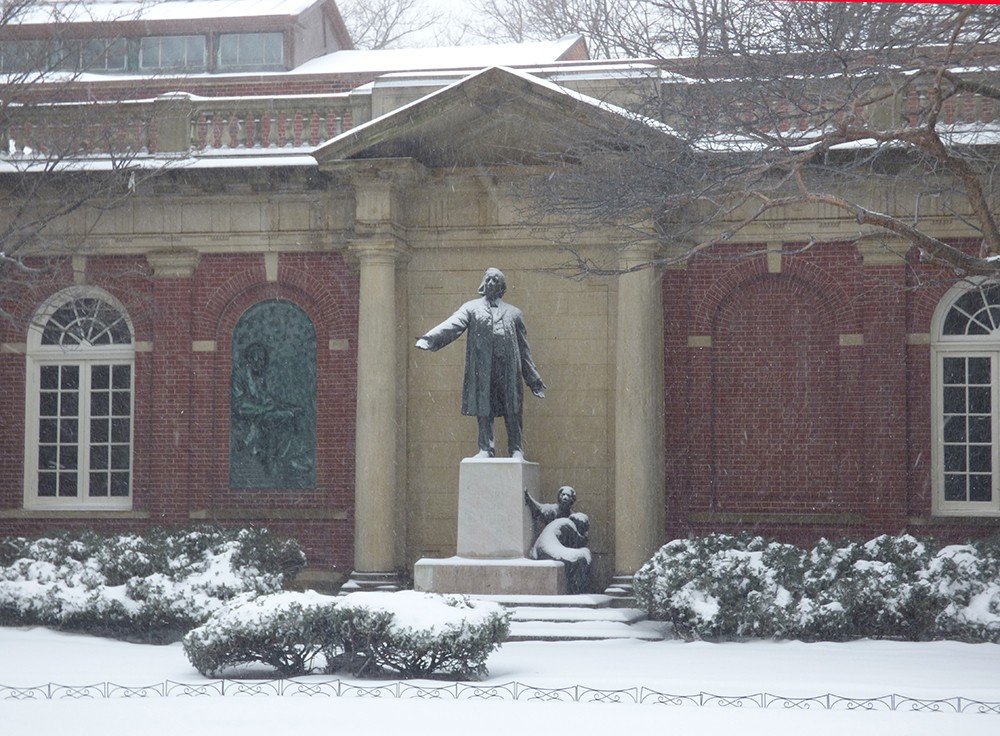 Henry Ward Beecher stands in the snow at Plymouth Church.
