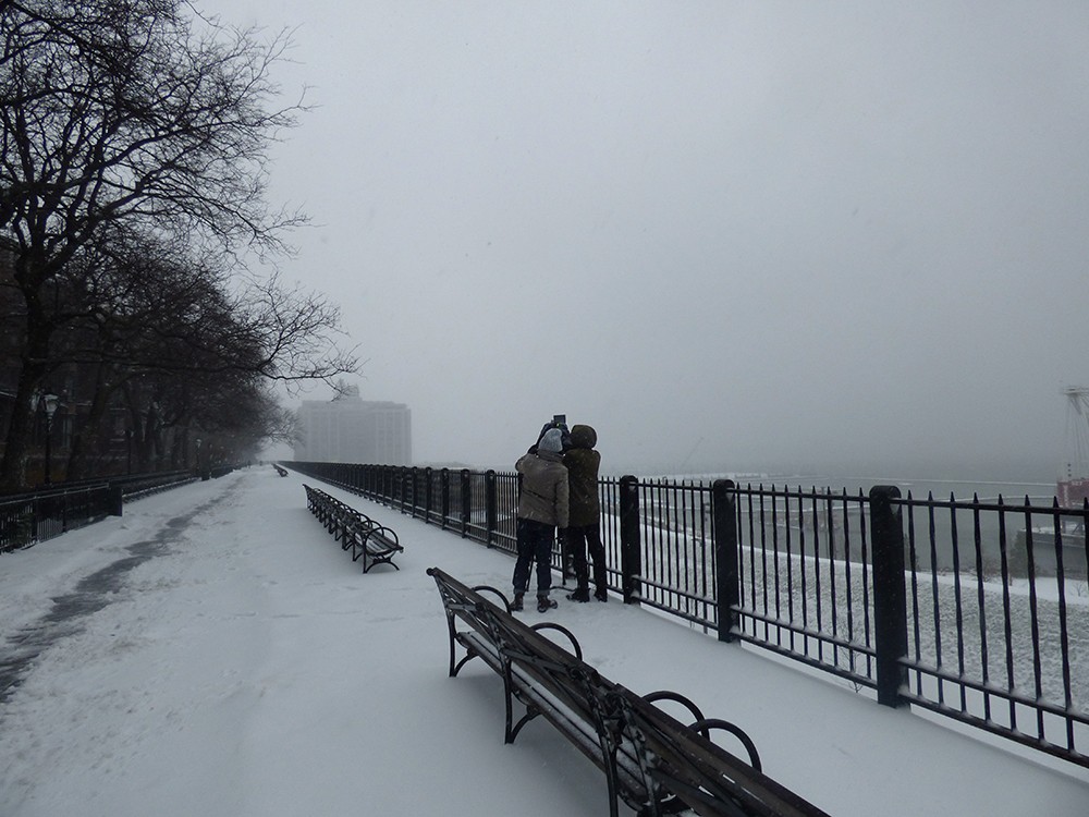 These folks enjoy a chilly photo shoot on the Promenade.