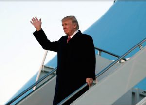 President Donald Trump waves as he disembarks Air Force One on March 5 at Andrews Air Force Base. AP Photo/Alex Brandon
