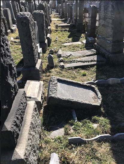 Dozens of headstones in Washington Cemetery were discovered dislodged over the weekend. Photos courtesy of Assemblymember Dov Hikind’s office