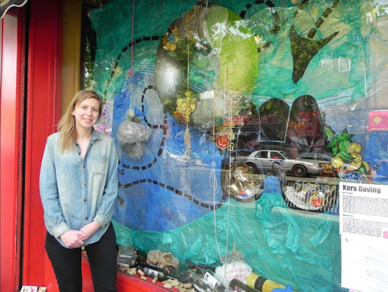 At the 2016 SAW, artist Kara Daving created an island made up of items found in the ocean in the window at Long’s Wines and Liquors. Eagle file photo by Paula Katinas