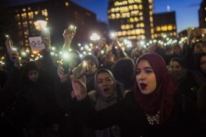 Muslim women rally for immigrant rights earlier this year in Manhattan. AP photo by Andres Kudacki