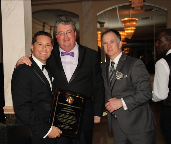Michael Cibella (left) and the Kings County Criminal Bar Association presented Gary Farrell (center, with Christopher D. Wright) with the Person of the Year Award at the KCCBA annual dinner on Saturday. Eagle photos by Mario Belluomo