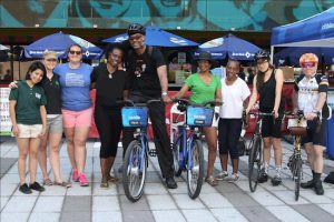 Councilmember Robert Cornegy Jr., pictured here with local officials and bike enthusiasts, has helped to boost awareness of bicycle safety in the community. Photo courtesy of Bedford Stuyvesant Restoration Corp.
