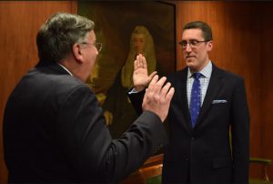 Raised by a judge and an assistant DA, Michael Farkas (pictured being sworn in as president of the KCCBA) was destined for Court Street. But he took a path that went through the United States army before he settled down as a criminal defense attorney. Photo by Rob Abruzzese.