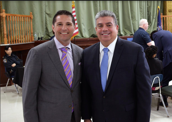 Michael Cibella (left), president of the Kings County Criminal Bar Association, and Acting District Attorney Eric Gonzalez took part in a program called “Begin Again,” which is meant to help community members get rid of old summons warrants on Friday and Saturday. Photos courtesy of the KCCBA
