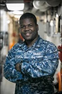 Petty Officer 2nd Class Marc Andre, who grew up in Brooklyn, is now serving aboard a ship in San Diego. Photo courtesy of U.S. Navy