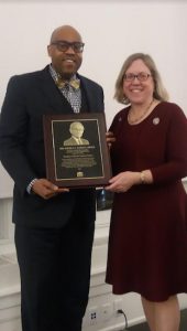 Claire Gutekunst, president of the NYS Bar Association, presents Sidney Cherubin, director of legal services at the VLV, with the 2017 Angelo T. Cometa Award. Photo courtesy of the NYSBA