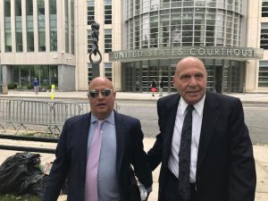 Carmine Avellino (right) and his attorney Scott Leemon walk into the park across from Brooklyn Federal Court after Avellino was sentenced to five-years probation and one-year house arrest for extortionate collection of credit. Eagle photo by Paul Frangipane