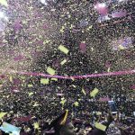 Brooklyn College graduates celebrate in waves of confetti at the Barclays Center. Eagle photo by Paul Frangipane