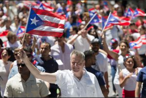 Mayor Bill de Blasio marches up Fifth Ave during the 59th National Puerto Rican Day Parade, Sunday, June 12, 2016. AP Photo/Mary Altaffer
