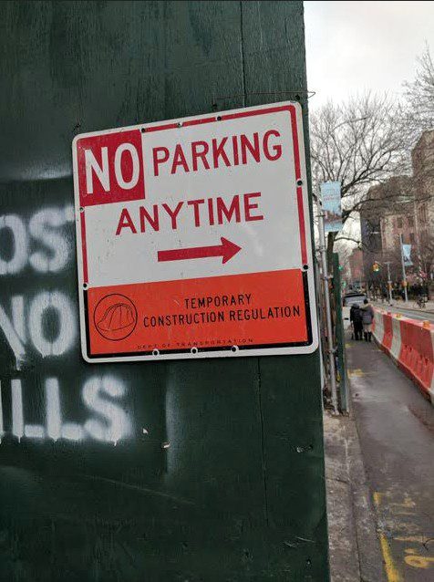 Signs like this one, erected by a contractor for Fortis Property Group at a former Long Island College Hospital (LICH) site in Cobble Hill, were bogus, but residents still haven’t been reimbursed for their very real parking tickets.  Photo courtesy of a contributor