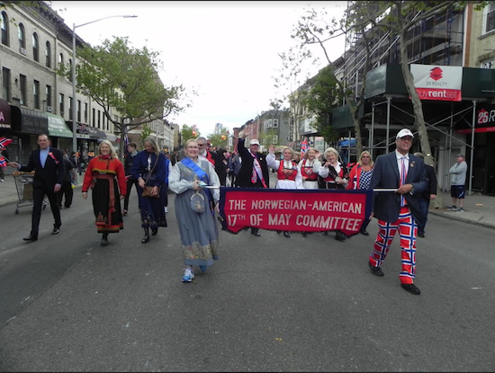 Leaders of the parade committee march in last year’s parade up Third Avenue. Eagle file photo by Paula Katinas