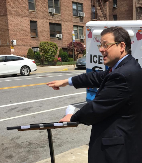 City Council candidate John Quaglione points at a solid white-line bike lane that prohibits cars or trucks from standing and indefensible fines if ticketed. Eagle photos by John Alexander